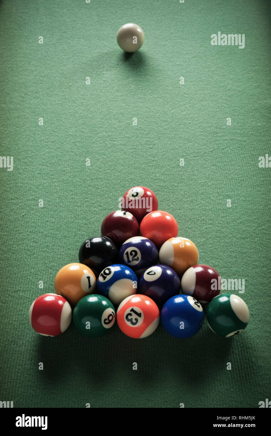 billiard table with green material and billiard balls Stock Photo Alamy