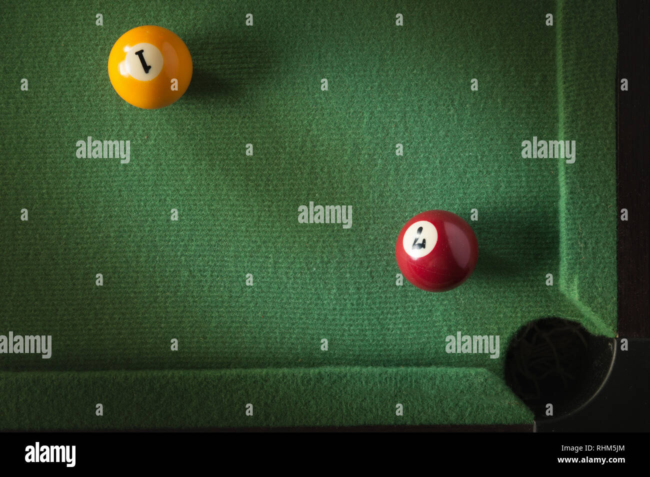 billiard table with green material and billiard balls Stock Photo Alamy
