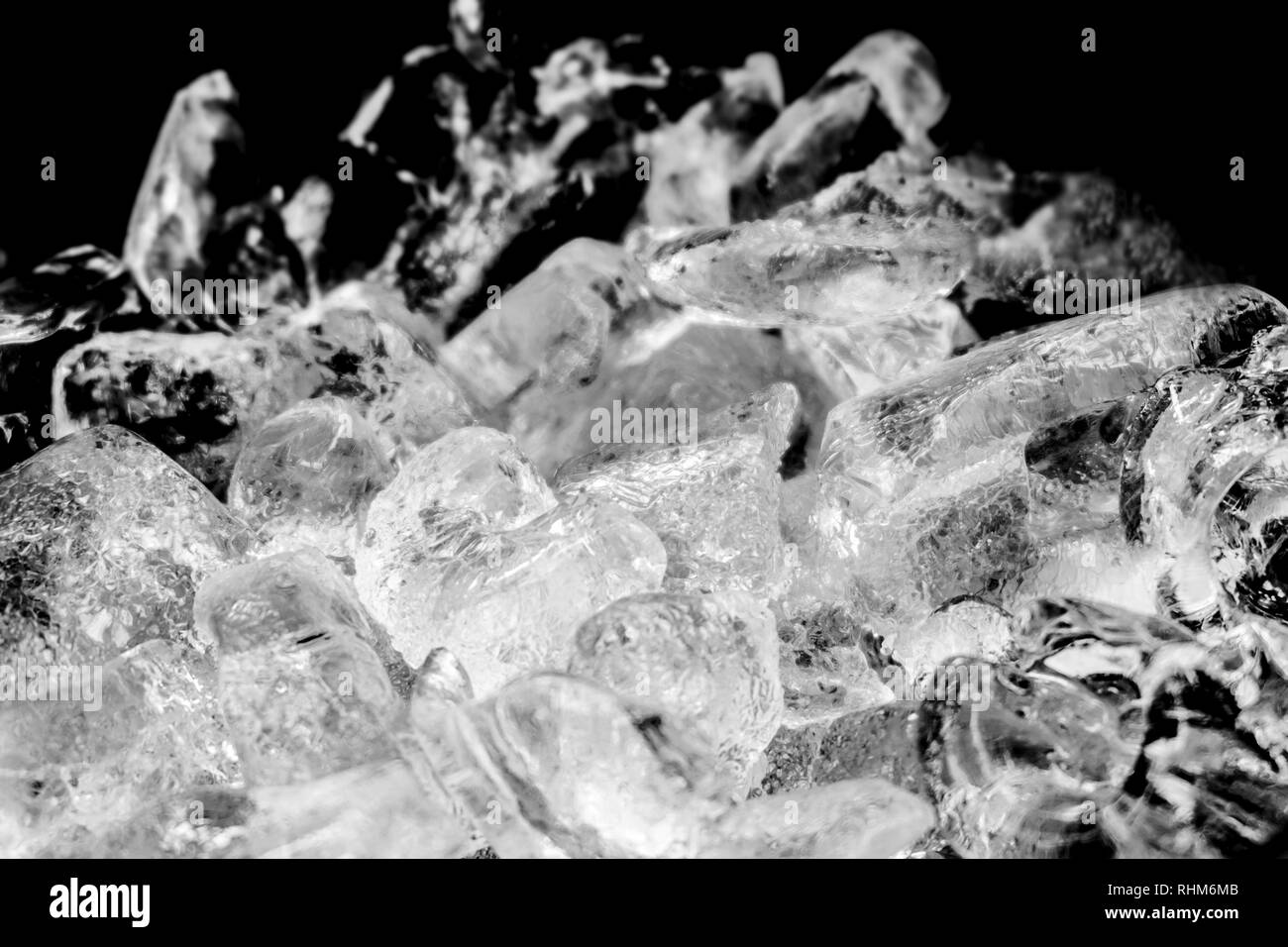 Pieces of crushed ice with black background Stock Photo Alamy