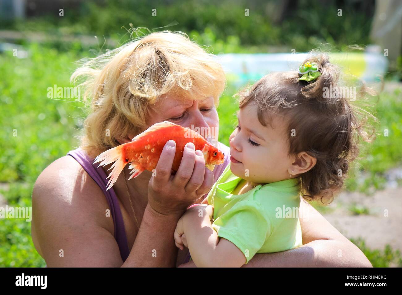 Showing baby how to fish hi-res stock photography and images - Alamy