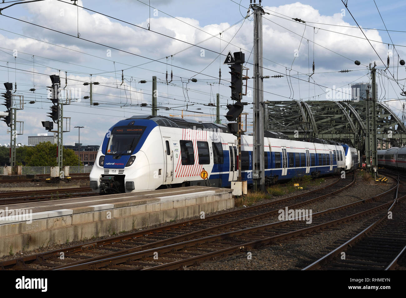 national express;electric mutiple unit;cologne main station;hohenzollern bridge;rhine;germany Stock Photo