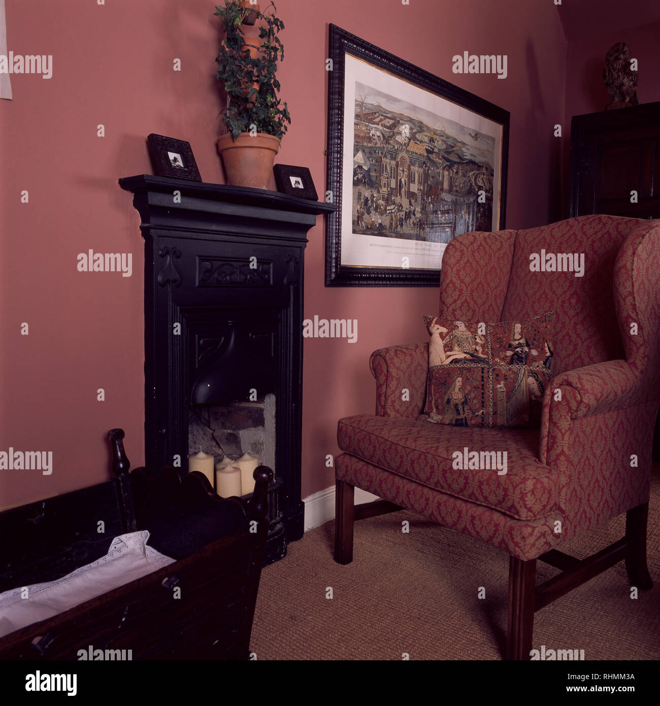 Pink upholstered armchair or wingchair Stock Photo