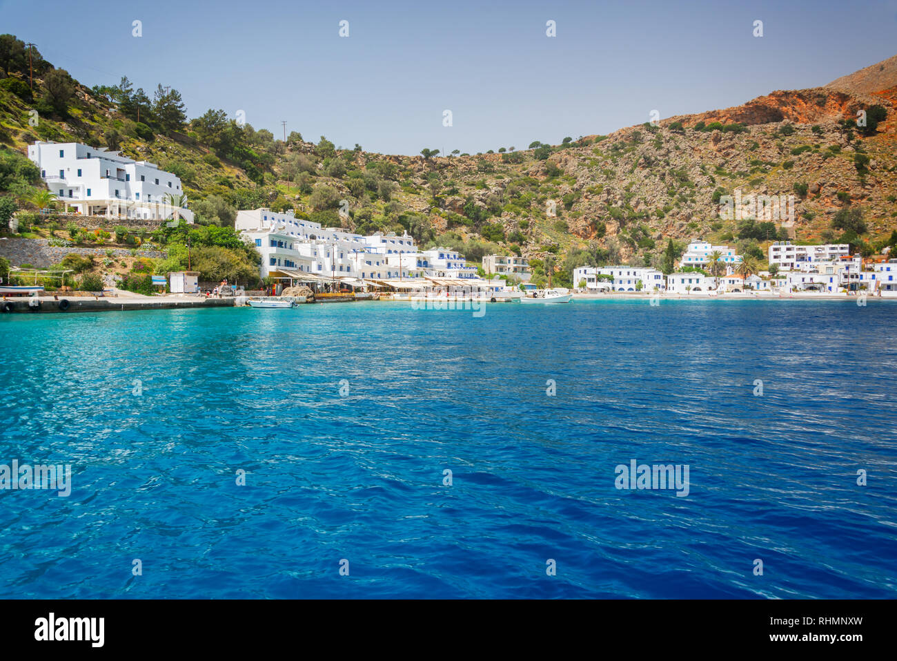 Scenic village of Loutro and the mediterranean sea  in Crete, Greece Stock Photo