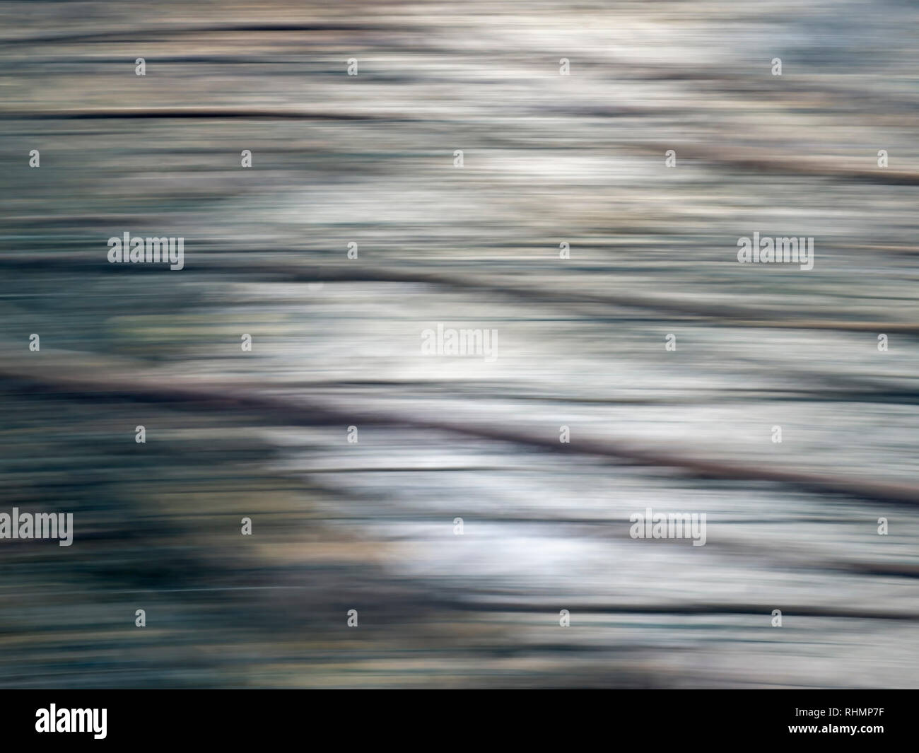 Abstract background from stream, running water and intentional camera movement for blurry effect. Light and shade. Stock Photo