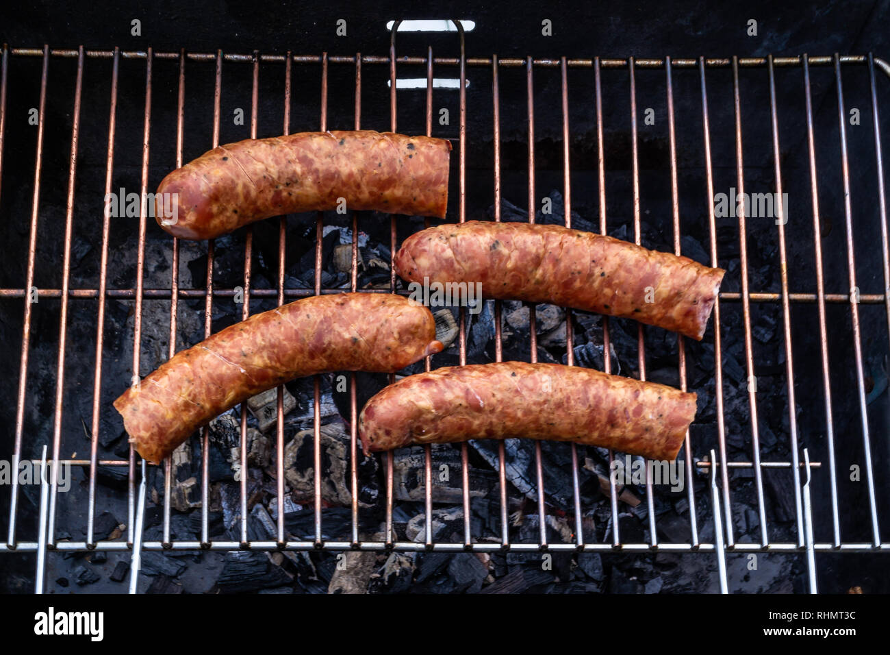 Roasted sausage on the grill Stock Photo Alamy