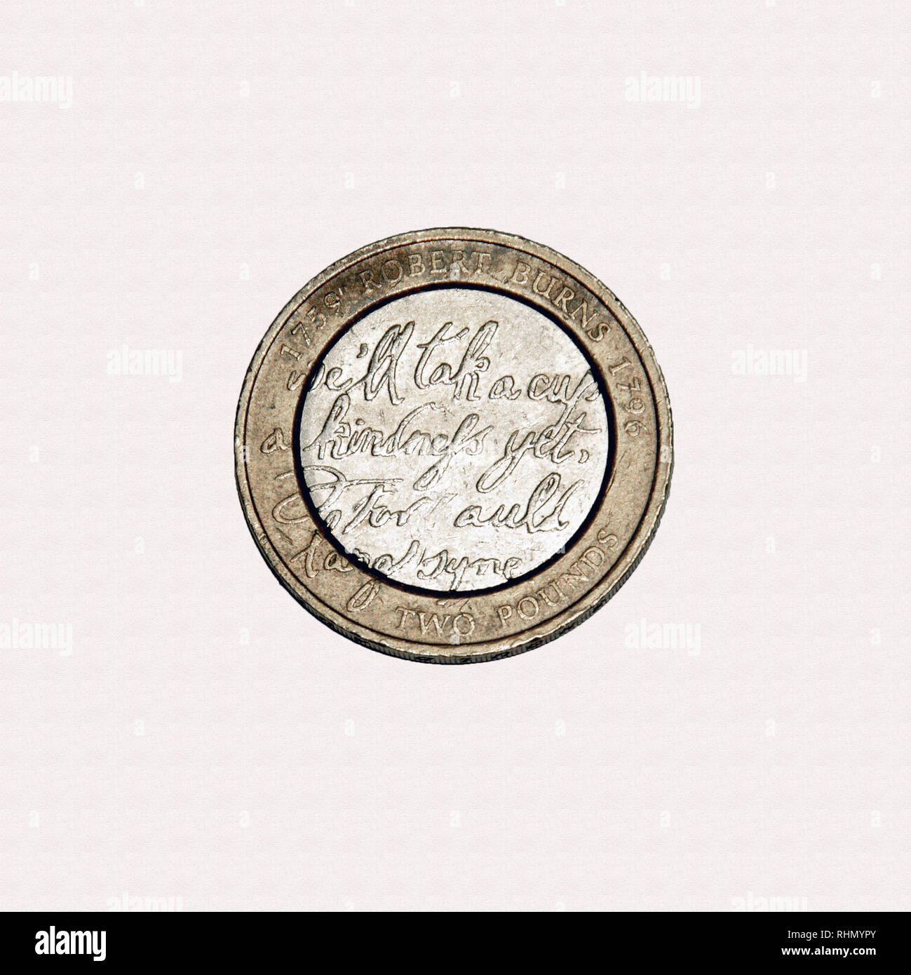 Limited edition British £2 coin commemorating 1611 Scottish Poet Robert  Burns featuring his most famous work `Auld Lang Syne` Stock Photo - Alamy