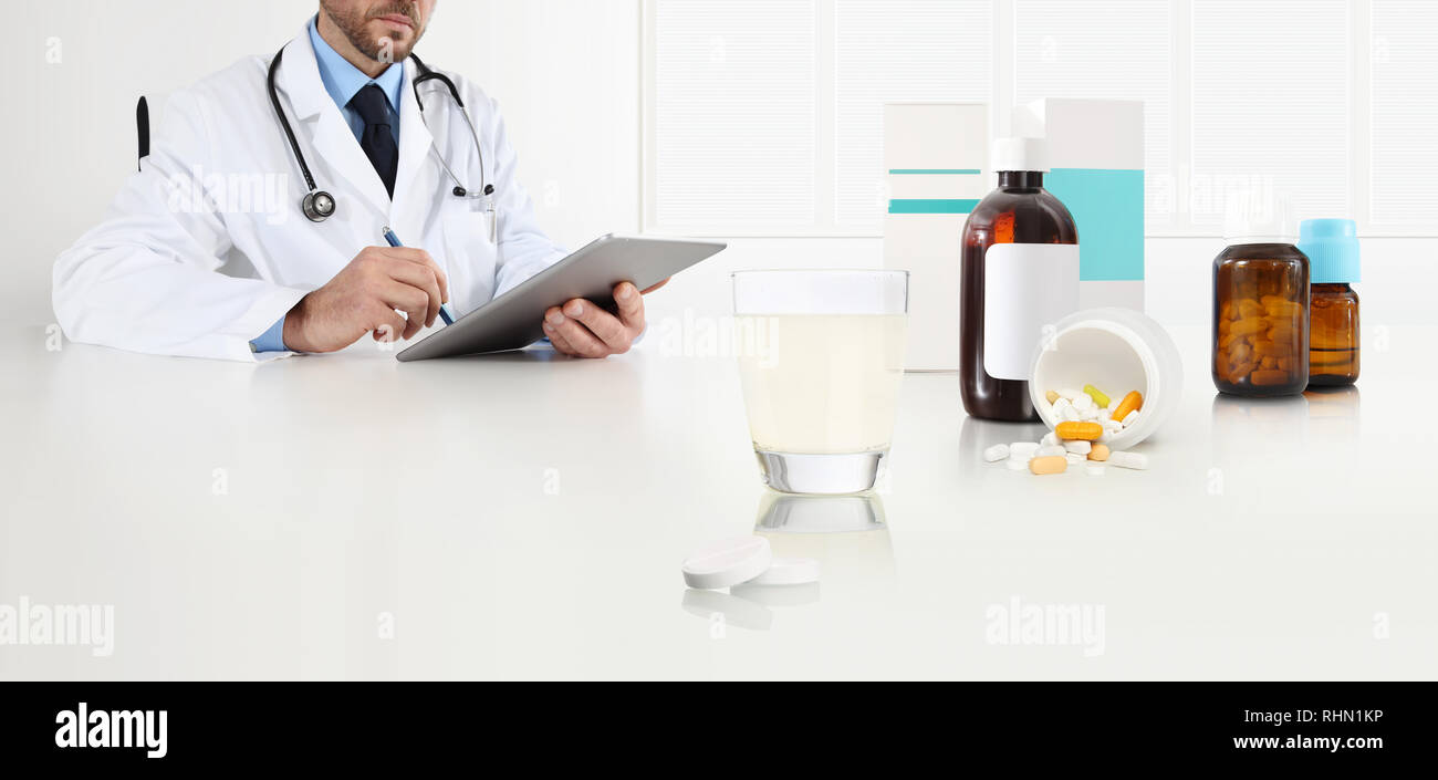 Doctor Writes The Medical Prescription With The Digital Tablet On