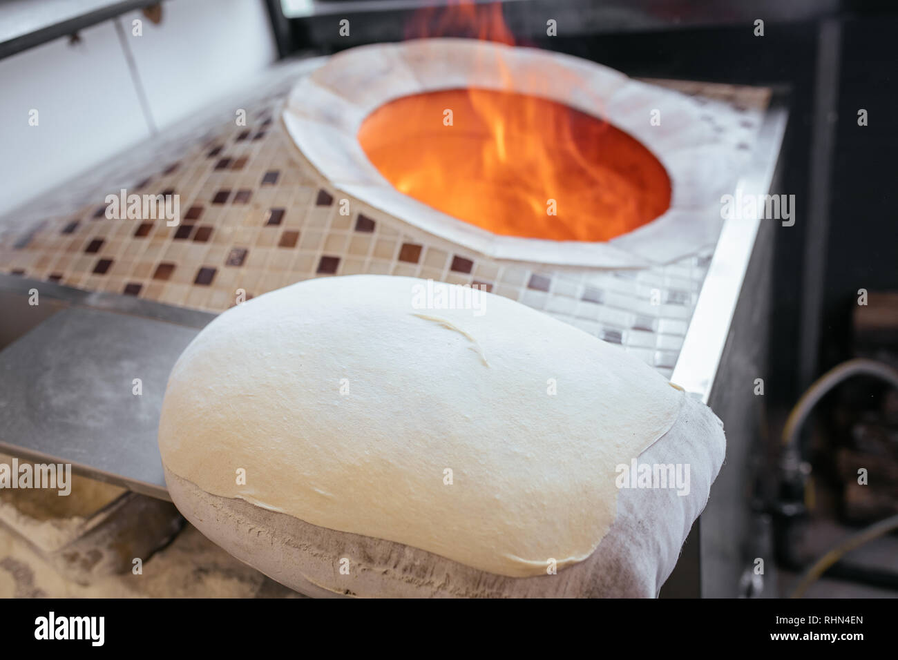 Traditional turkish wood fired stone brick oven and pita or pide bread dough. This stone oven