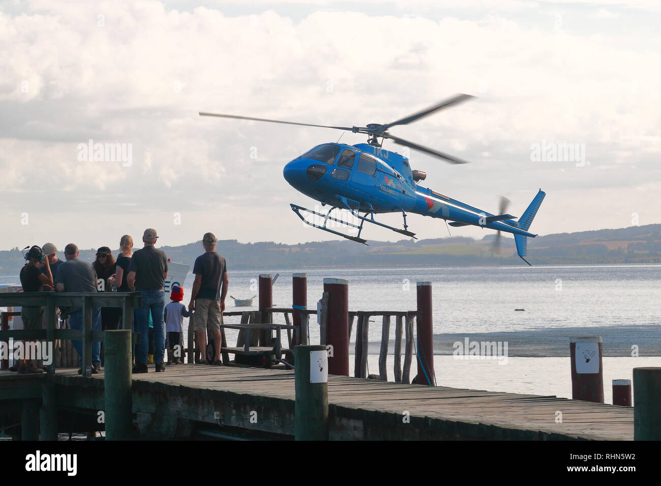 Tourists can visit the volcanic White Island by helicopter from Lake Rotorua, New Zealand Stock Photo