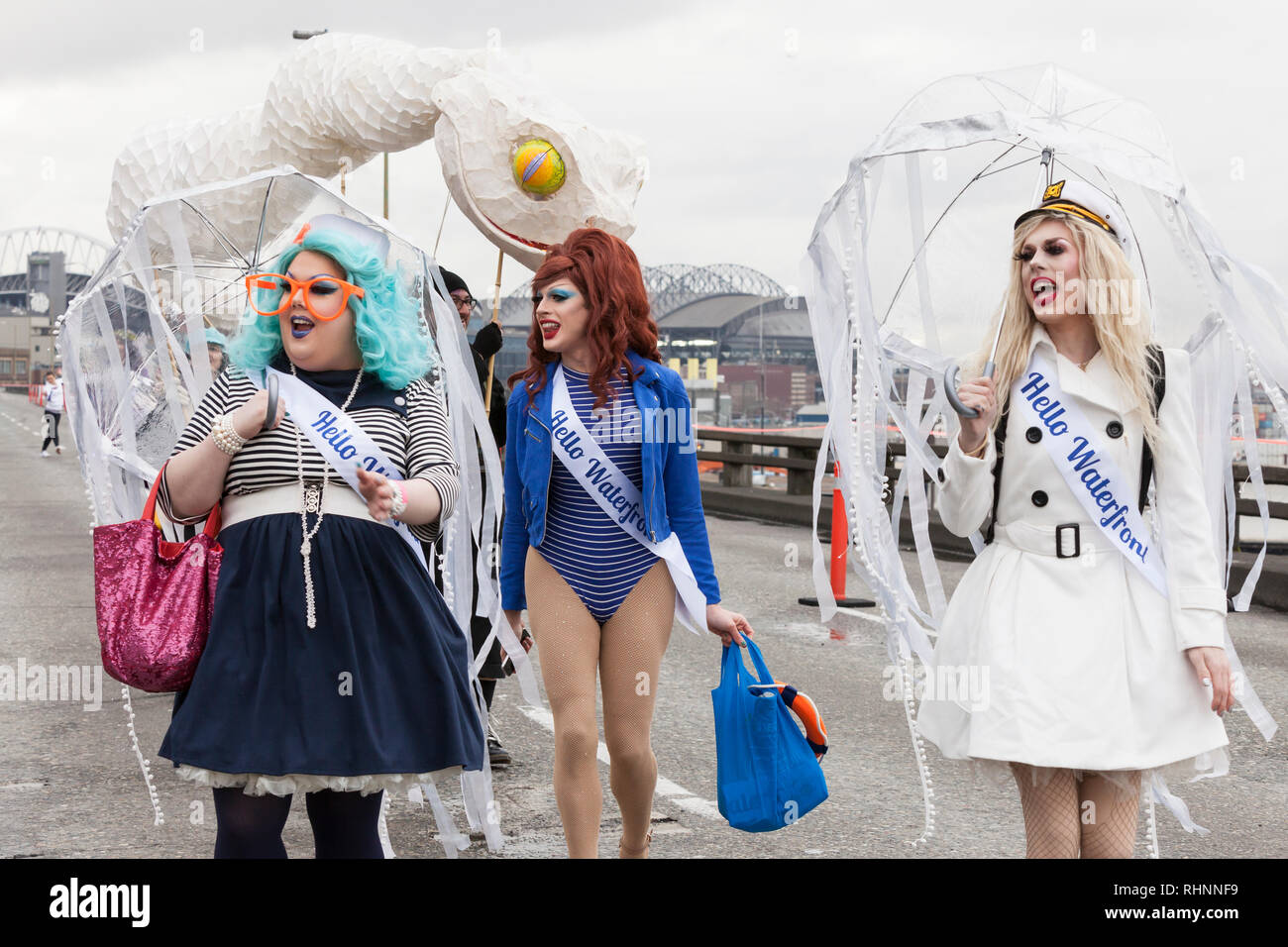 Seattle, Washington, USA. 2nd February, 2019. The Hello/Goodbye Drag Queens walk in a procession along the closed Alaskan Way Viaduct. An estimated 70,000 people attended the Hello Goodbye: Viaduct Arts Festival as part of the grand opening of the state-of-the-art tunnel spanning two-miles under downtown. The festival, which took place on the elevated highway, began with a processional featuring music and performances from regional artists and organizations. Credit: Paul Christian Gordon/Alamy Live News Stock Photo