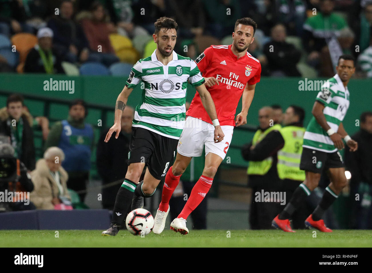 Lisbon, Portugal. 03rd Feb, 2019. Bruno Fernandes of Sporting CP (L) vies for the ball with Andreas Samaris of SL Benfica (R) during the League NOS 2018/19 footballl match between Sporting CP vs SL Benfica.  (Final score: Sporting CP 2 - 4 SL Benfica) Credit: SOPA Images Limited/Alamy Live News Stock Photo
