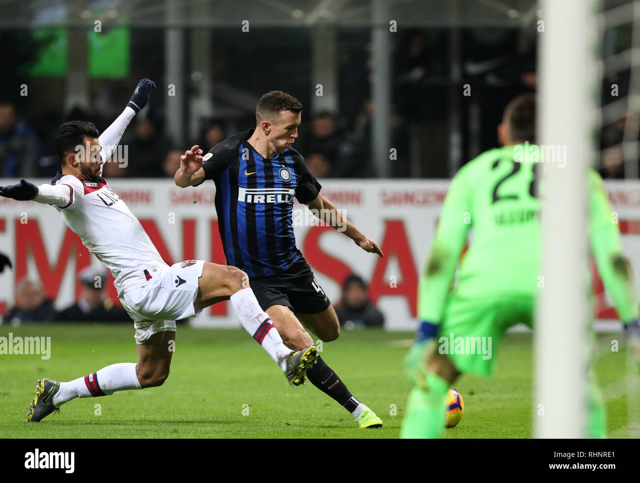 Milan. 3rd Feb, 2019. FC Inter's Ivan Perisic (C) vies with Bologna's Giancarlo Gonzalez (L) during the Serie A soccer match between FC Inter and Bologna, in Milan, Italy, Feb.3, 2019. Bologna won 1-0. Credit: Cheng Tingting/Xinhua/Alamy Live News Stock Photo