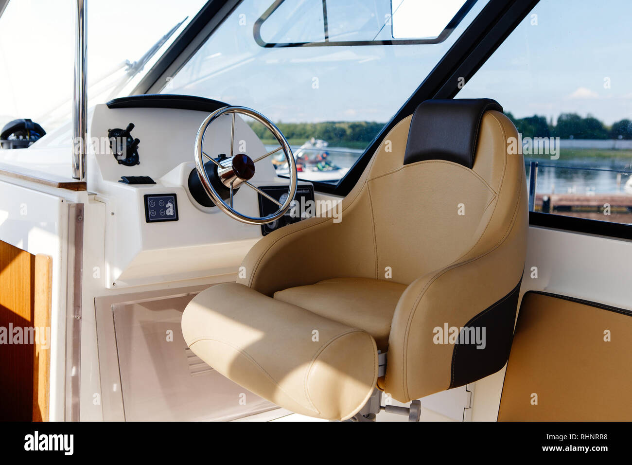 steering wheel on a luxury yacht cabin Stock Photo Alamy