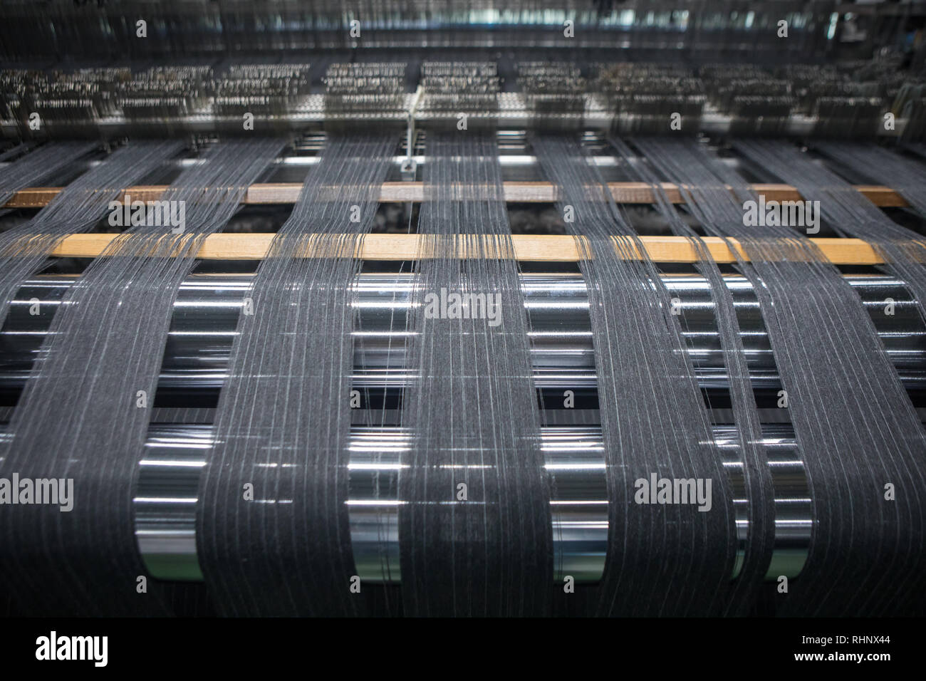 Loom Machine Threading Yarn thread lines on the weaving loom machine. A loom machine for ...