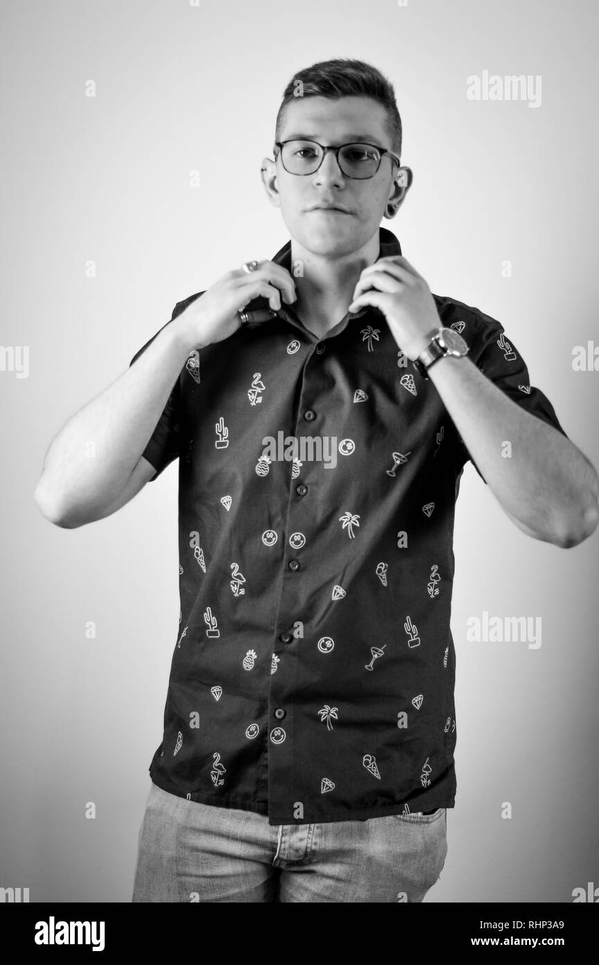 Portrait of a young man with glasses Stock Photo - Alamy