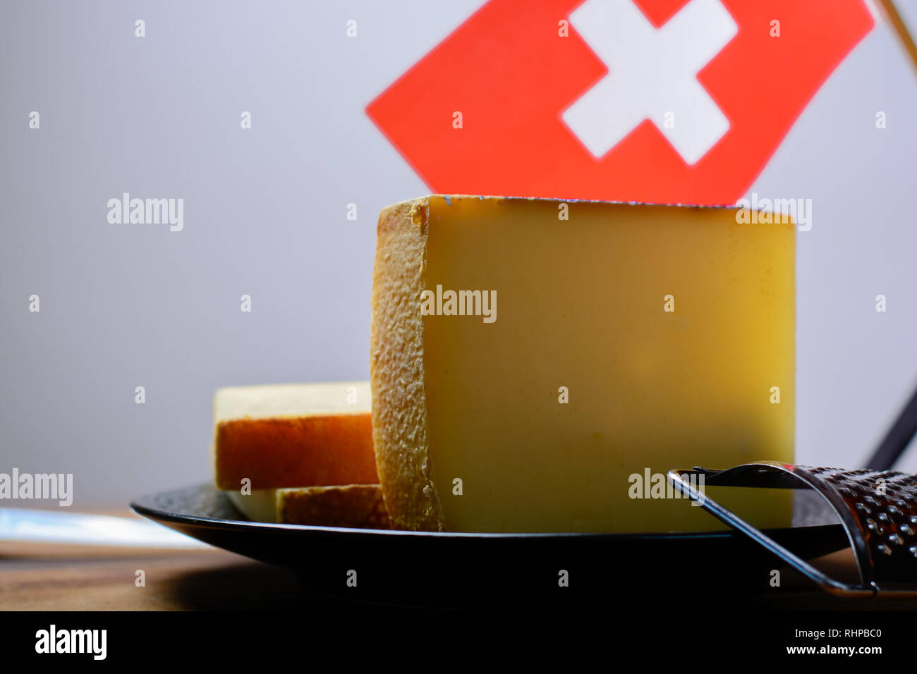 Block of Swiss hard cheese appenzeller used for traditional fondue and ...