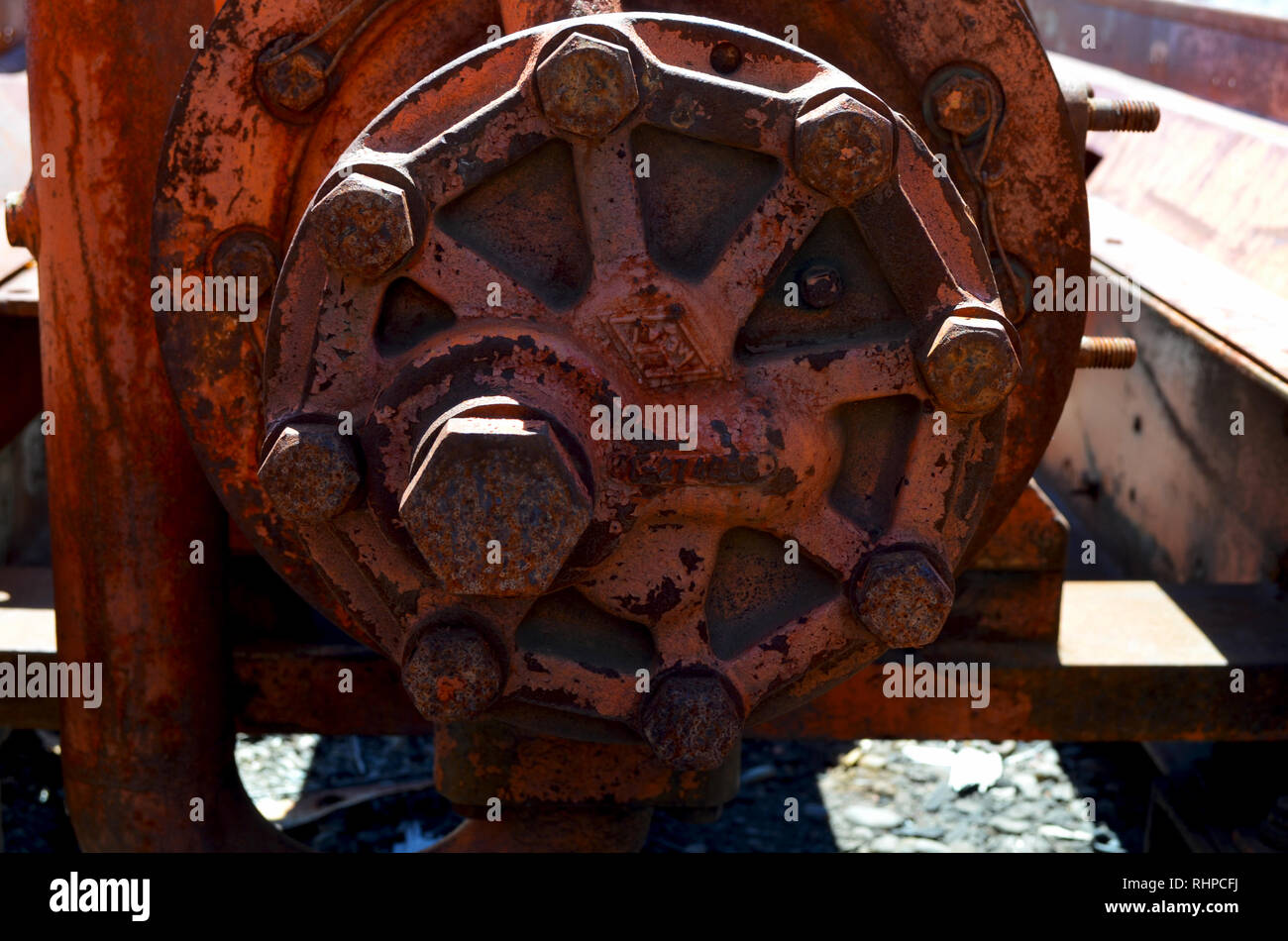 Rusty industrial machinery at Mina Escondida, an abandoned lead, zinc and copper mine near Puerto Guadal, Chile Stock Photo