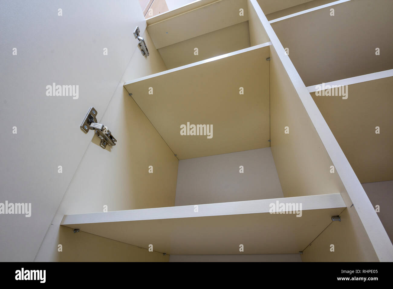 Interior Of White Plastic Cabinet Or Clothing Wardrobe With