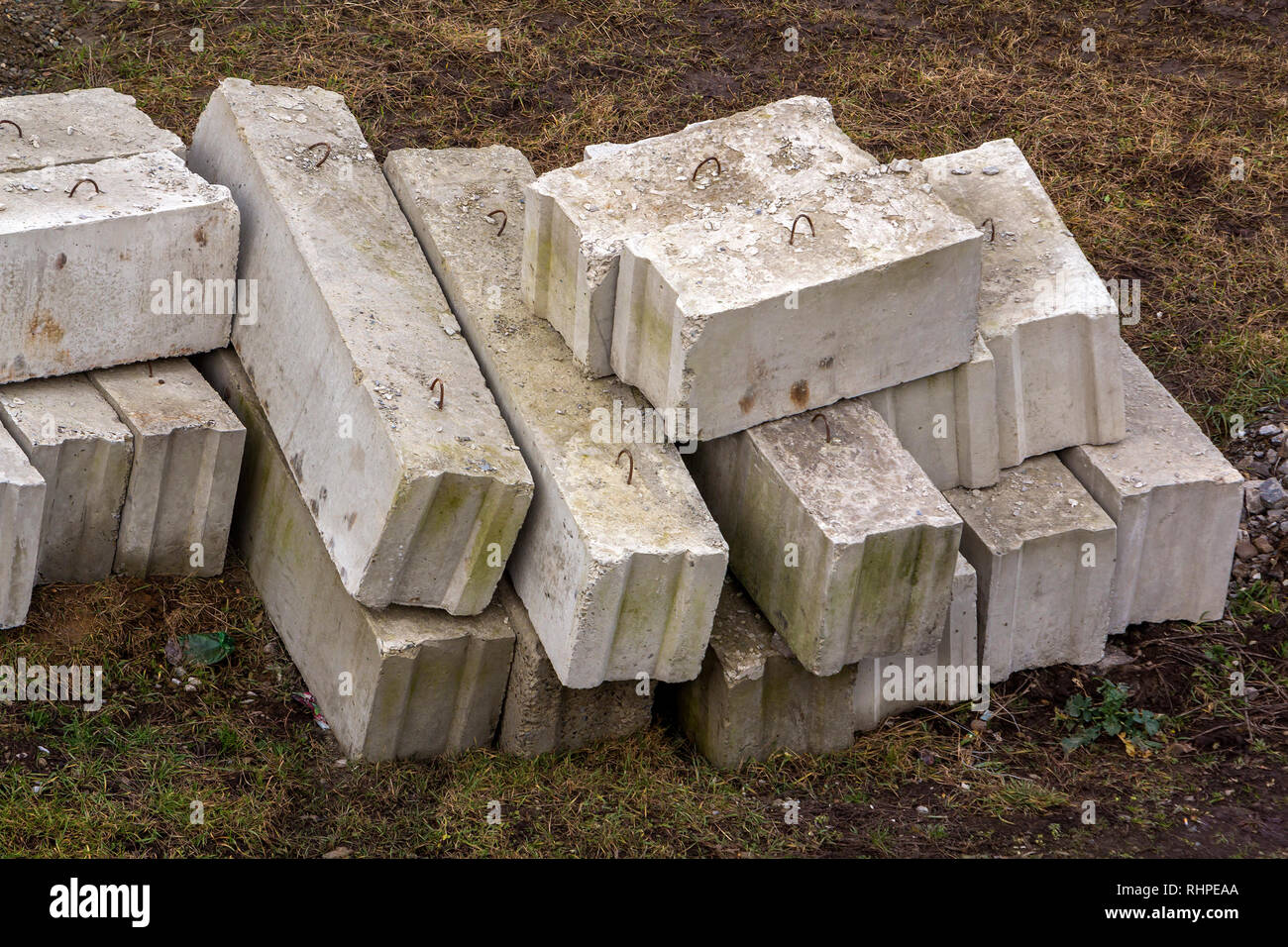 Stack of rough natural brown uneven different sizes and forms stone
