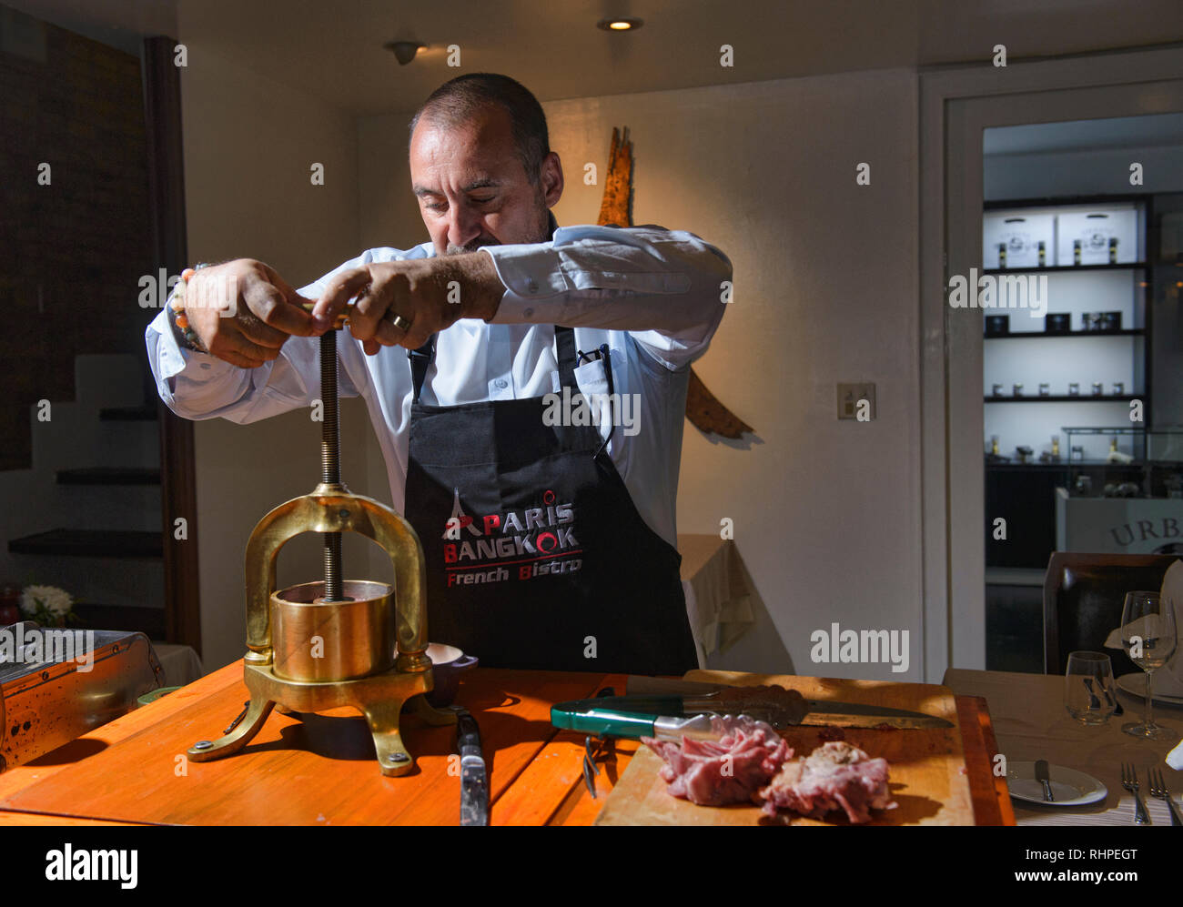 French chef preparing pressed duck, Bangkok, Thailand Stock Photo Alamy