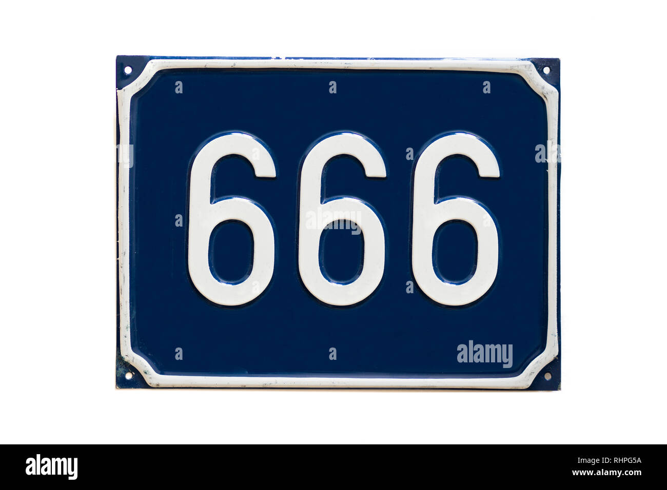 Number 666, devil sign and symbol on a street number plate isolated on the white background Stock Photo