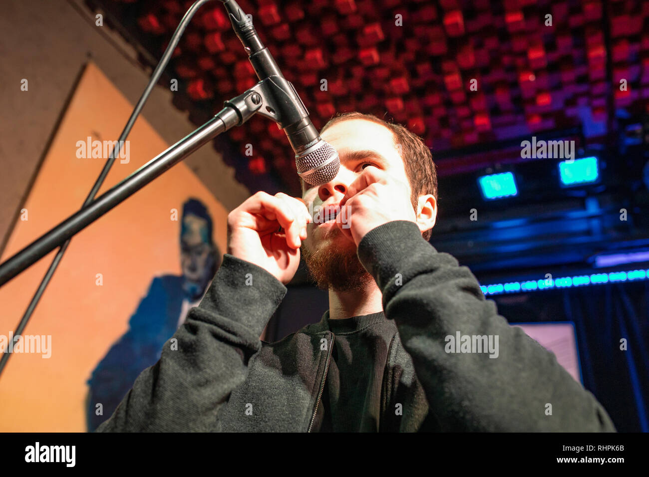 Musician on stage playing jew'sharp. Irish and scottish folk music concert, Blue Note, Poznan