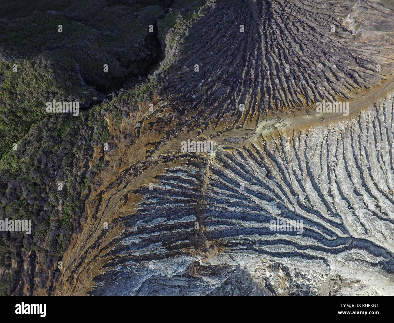 The unique pattern on the top of Ijen volcano. The pattern formed by rain water erosion on the side of Kawah Ijen. Stock Photo