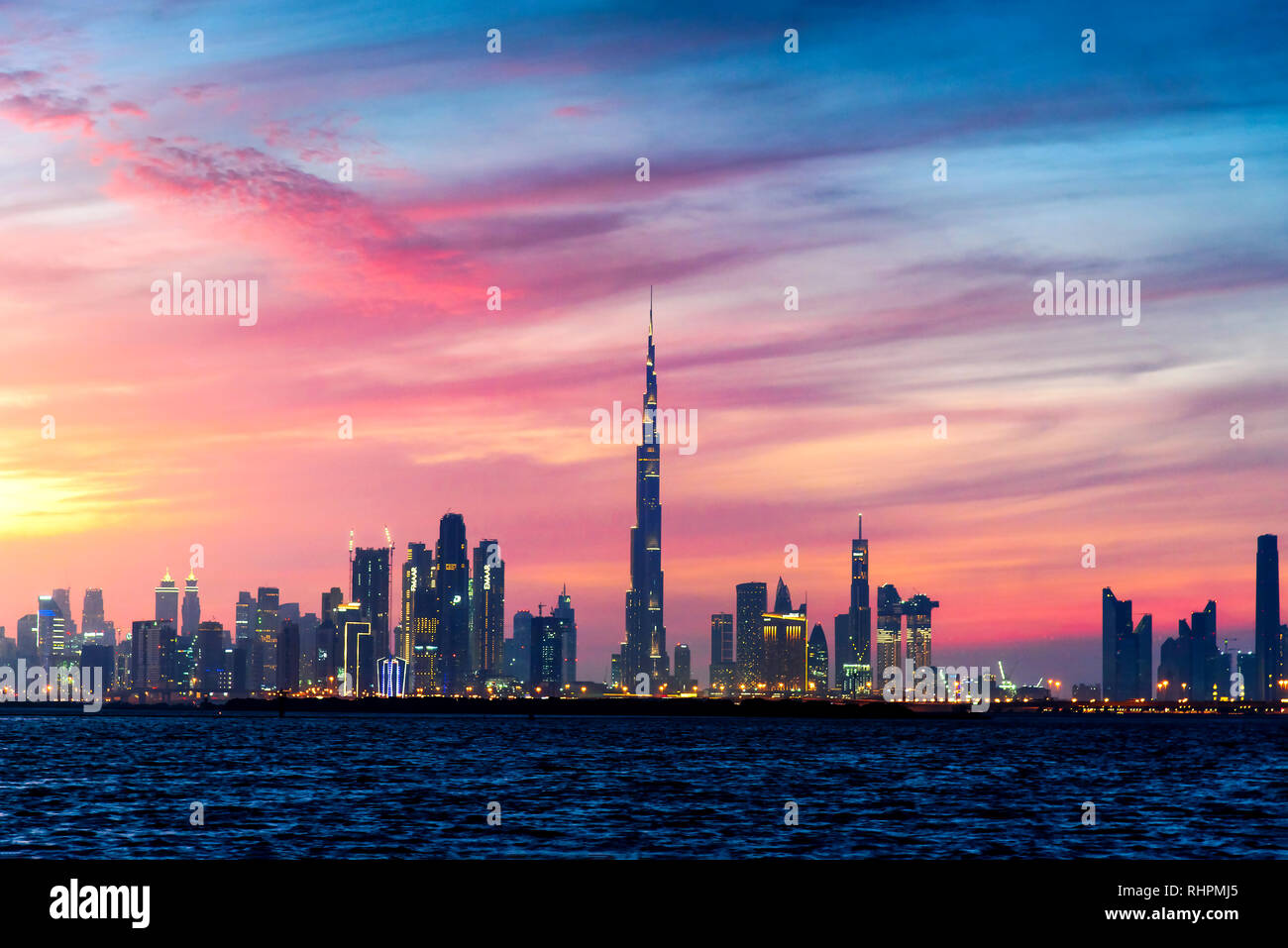 Dubai, United Arab Emirates - January 10, 2019: Beautiful winter sunset over Dubai panorama landmark view from the Dubai creek harbor Stock Photo