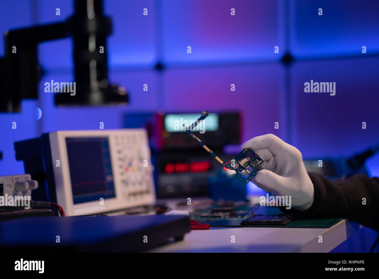 Repair cell phone pcb Stock Photo - Alamy