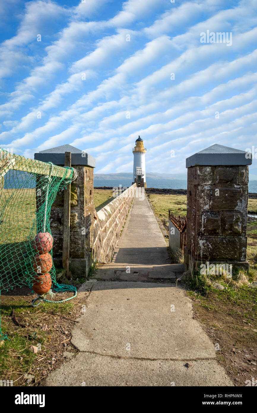 Spectacular Mackerel sky above the lighthouse of Tobermory in Scotland Stock Photo