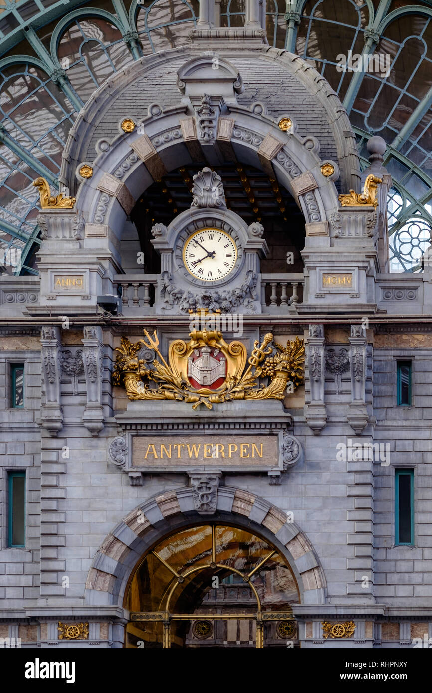 Clock at the upper level of the Central Station in Antwerp. The original building was designed by Clement Van Bogaert and was constructed between 1895 Stock Photo