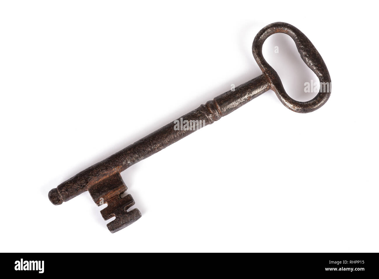 Old key isolated on white background Stock Photo - Alamy