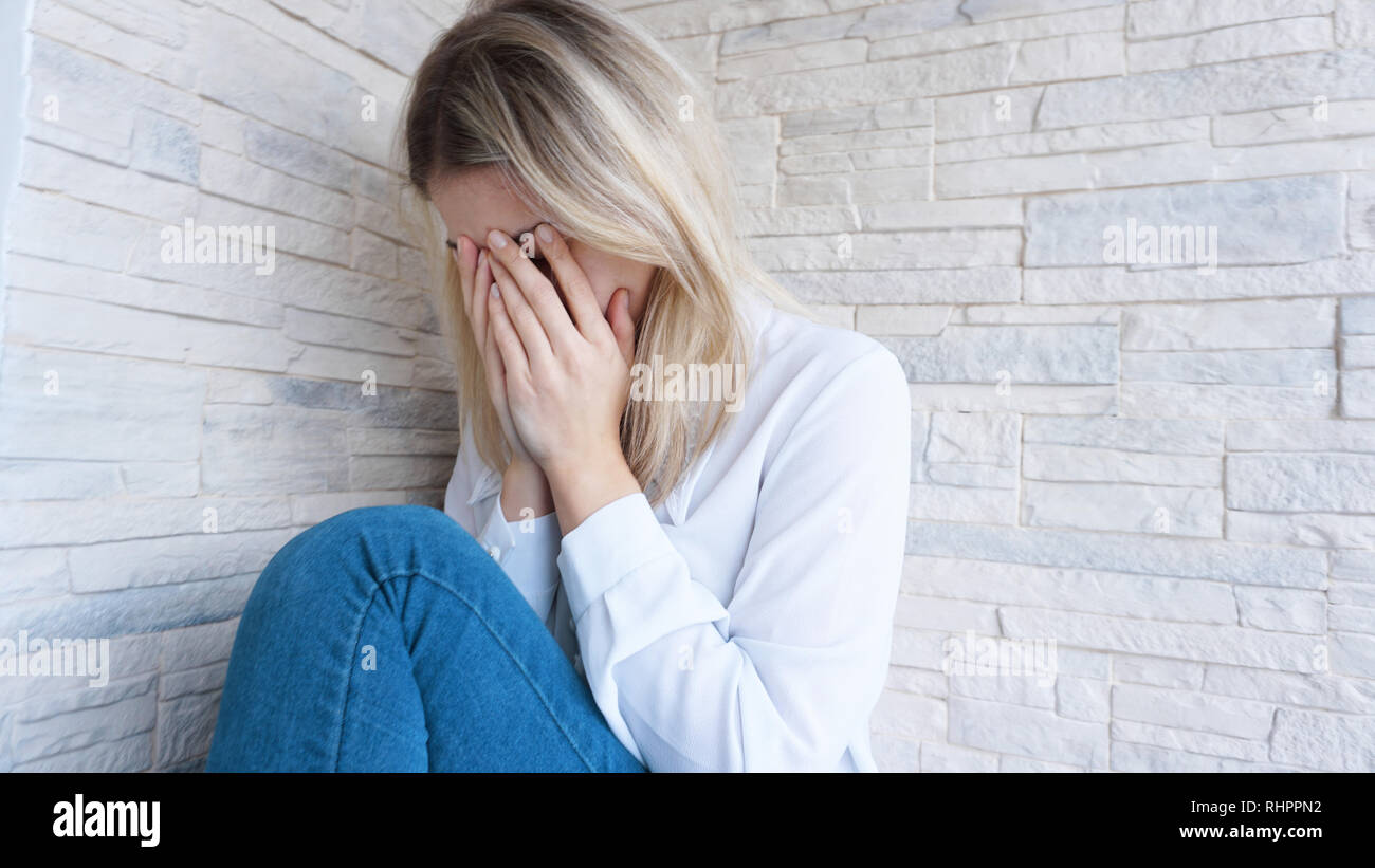 Tired depressed beautiful young hi-res stock photography and images - Alamy