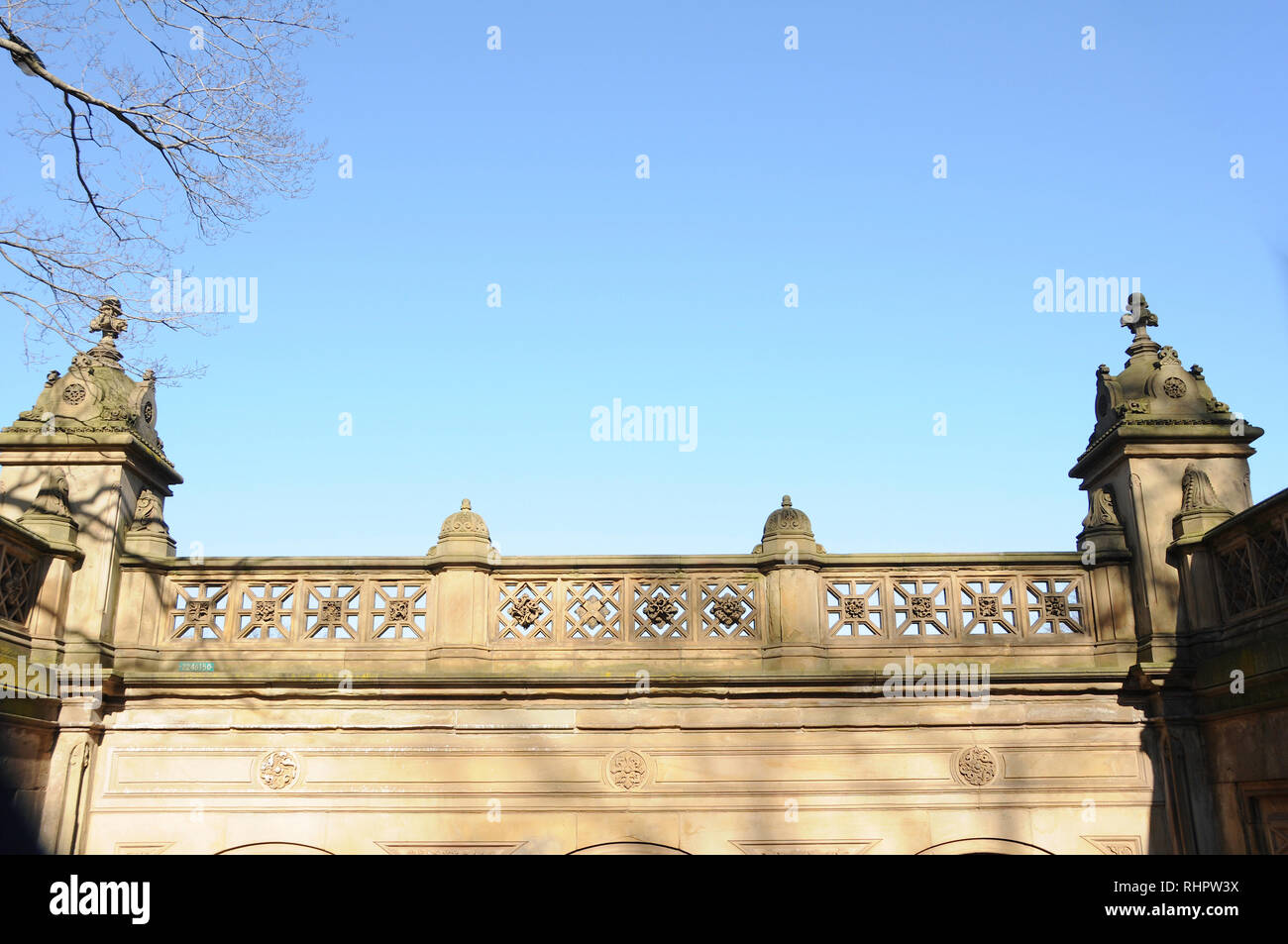 A portion of the stylish art deco and beaux art balcony architecture of the Bethesda fountain garden in New York City's iconic Central Park. Stock Photo