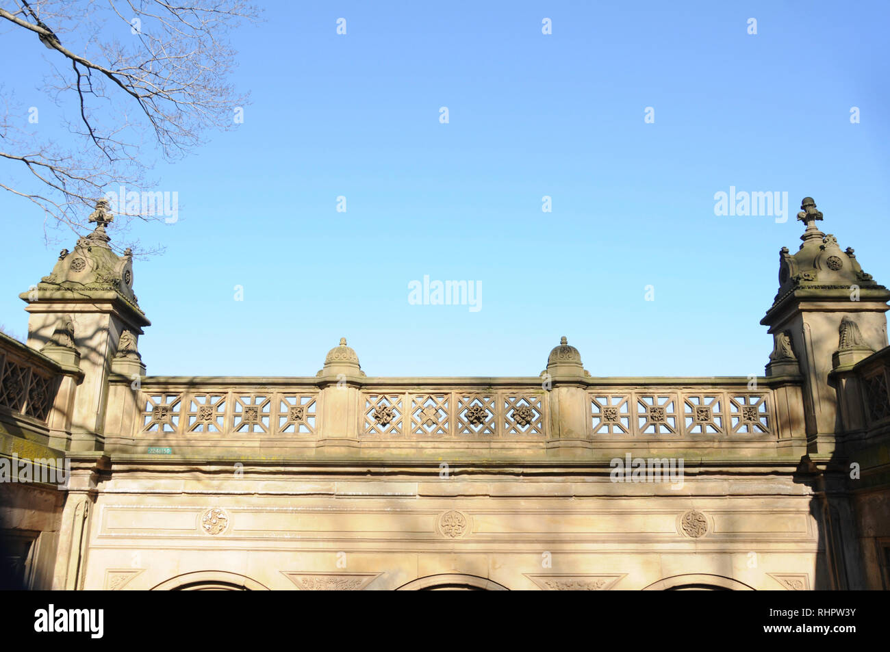 A portion of the stylish art deco and beaux art balcony architecture of the Bethesda fountain garden in New York City's iconic Central Park. Stock Photo