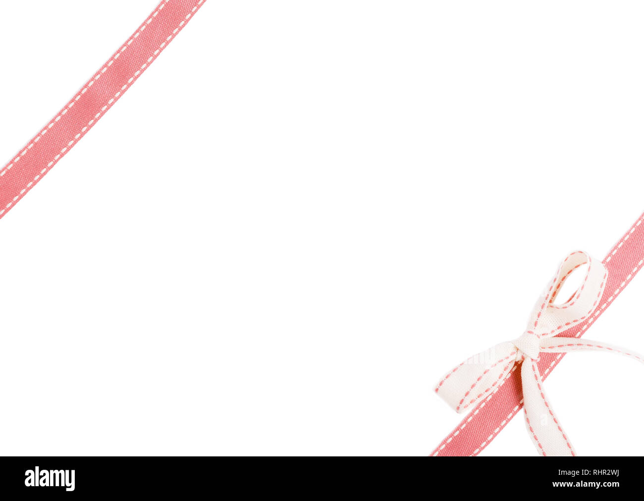 Pink ribbon with bow isolated on white background Stock Photo - Alamy