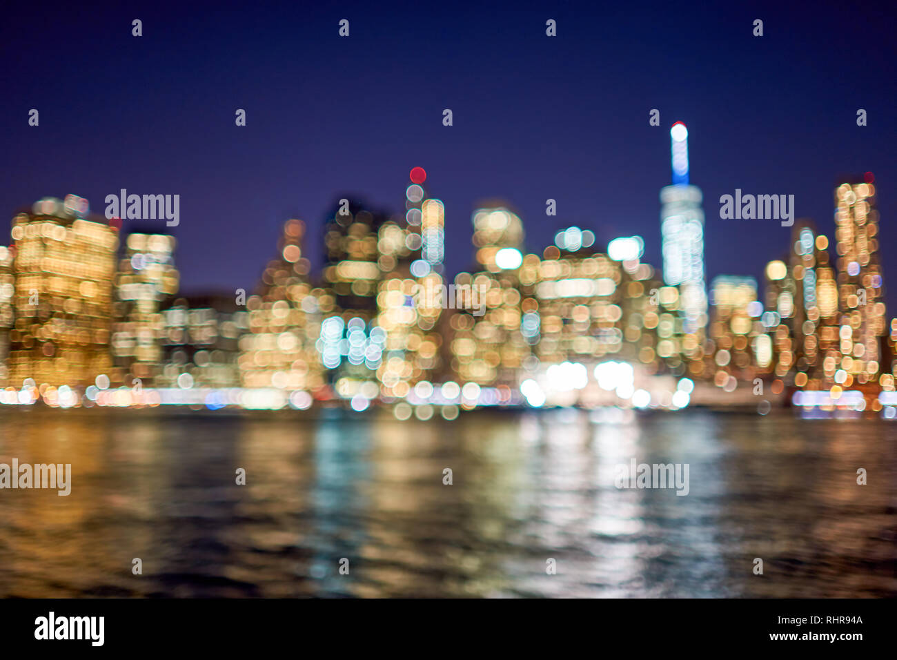 Defocused view of New-York City downtown from Brooklyn at night Stock ...
