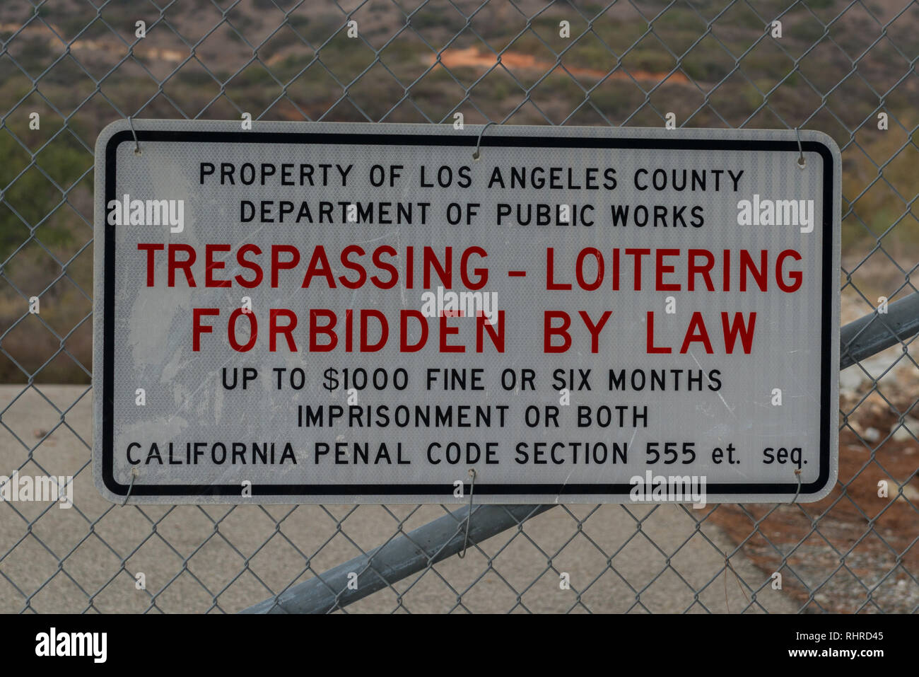 Sign warning against trespassing and loitering in Claremont California