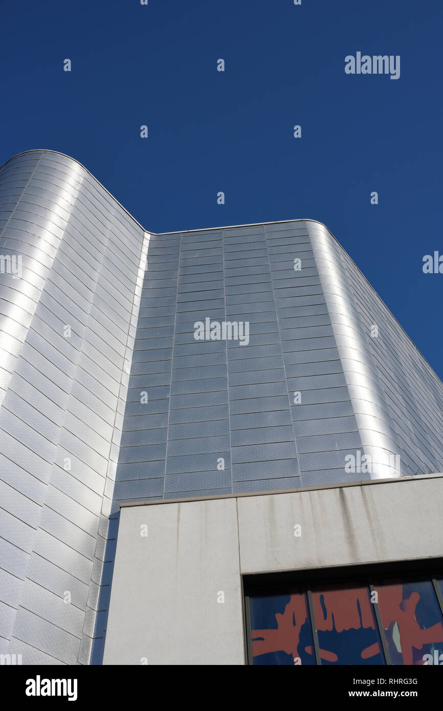 Modern building exterior with aluminium rainscreen cladding, sunlight ...