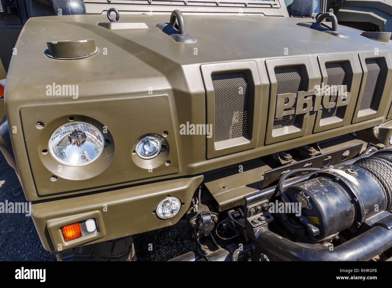 International military technical forum ARMY-2018. Special multi-purposes armored vehicle Rys, Iveco LMV. Close-up view of the headlight, grille and wi Stock Photo
