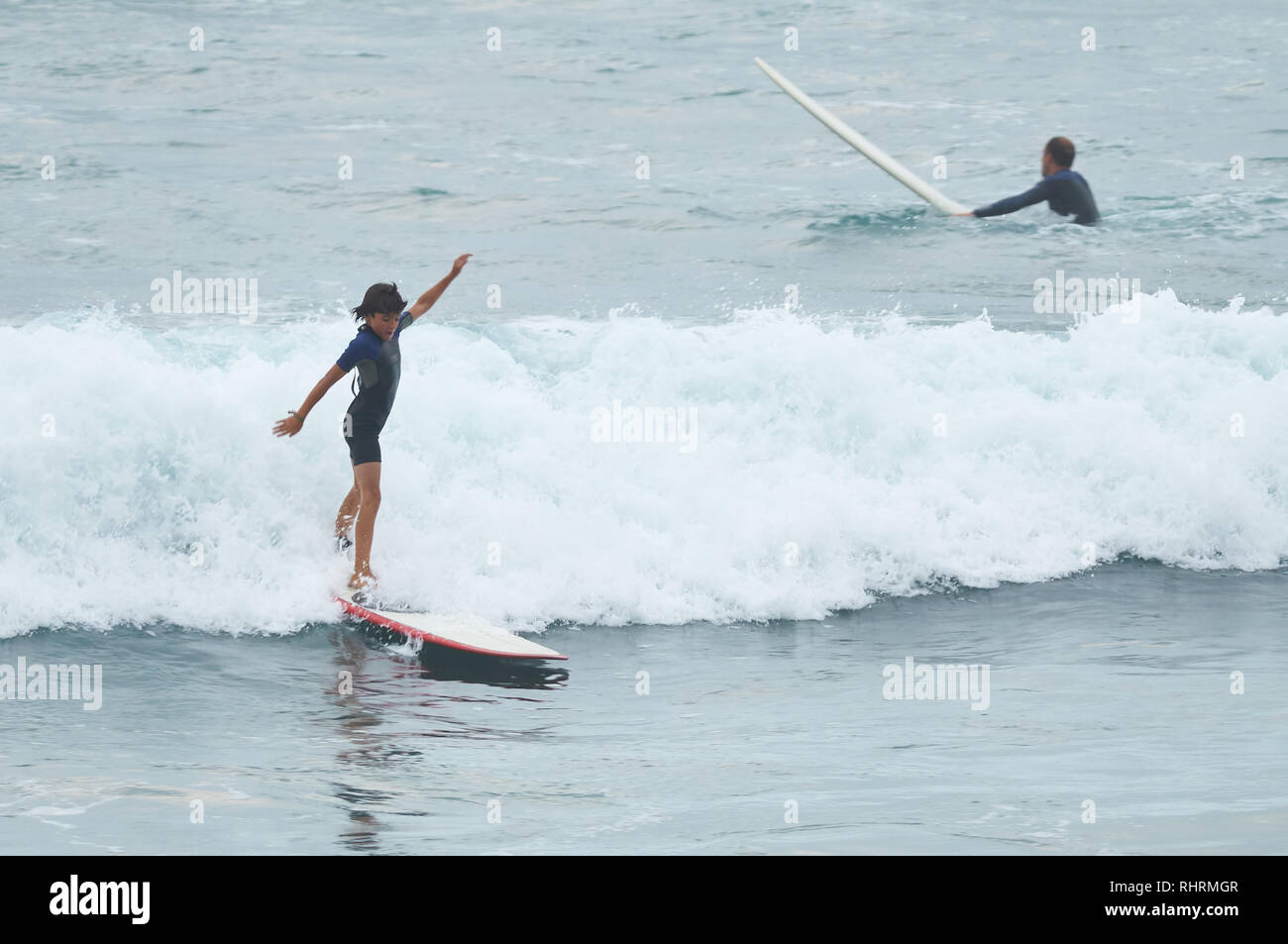 Chlid surfing hires stock photography and images Alamy