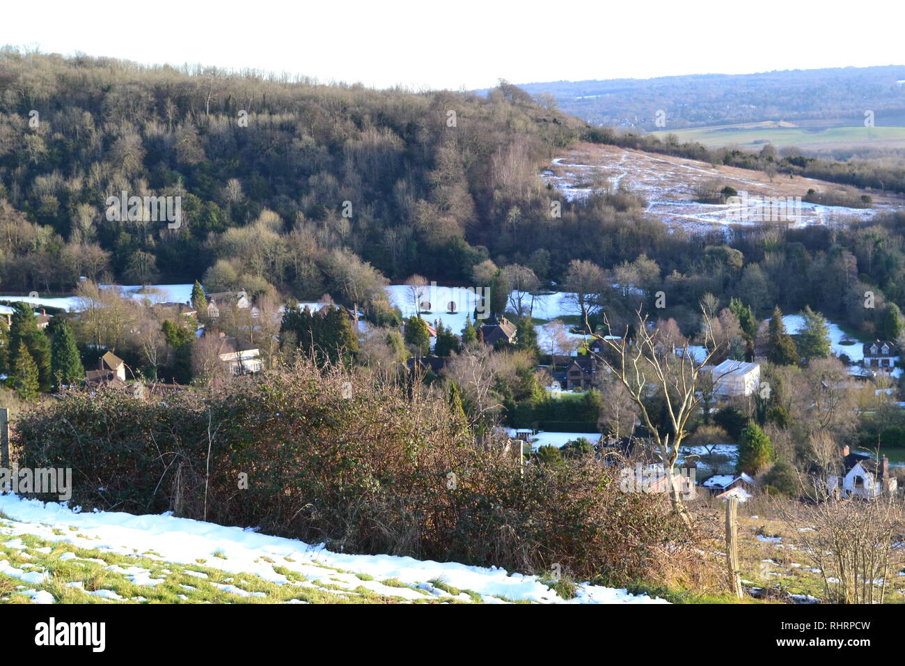 Looking down on an offshoot of Otford village from high on Fackenden Down in winter, February 2019 Stock Photo