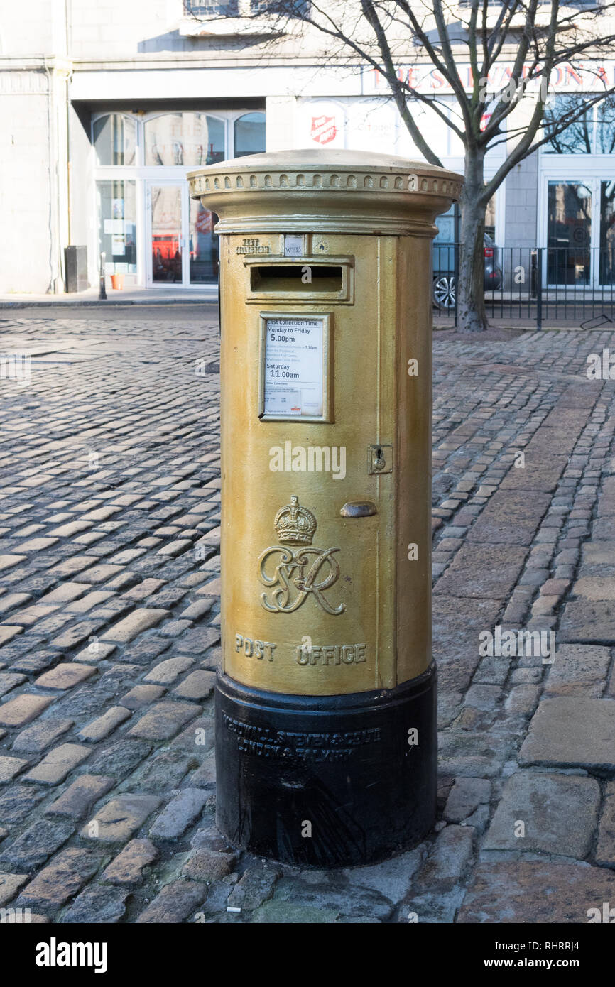 Gold post box celebrating the 2012 summer olympics gold medal winner Katherine Grainger who won gold in Rowing - Women's Double Sculls - Aberdeen Stock Photo