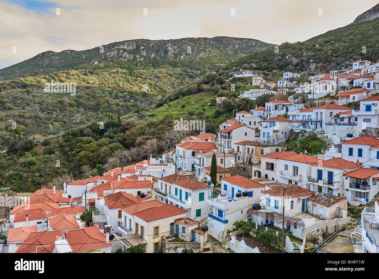 The Historical Byzantine village Velanidia near cape Malea, Greece. In the Cave above the village is visible the Holy Monastery of Zoodochos Pighi. Stock Photo