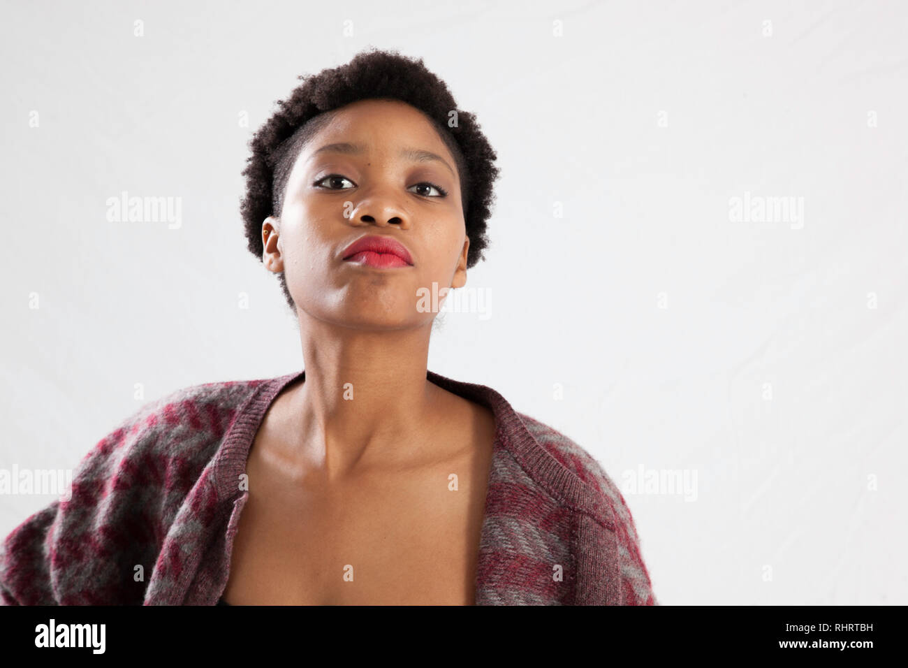 Beautiful Black woman with bare shoulders and a jacket Stock Photo - Alamy