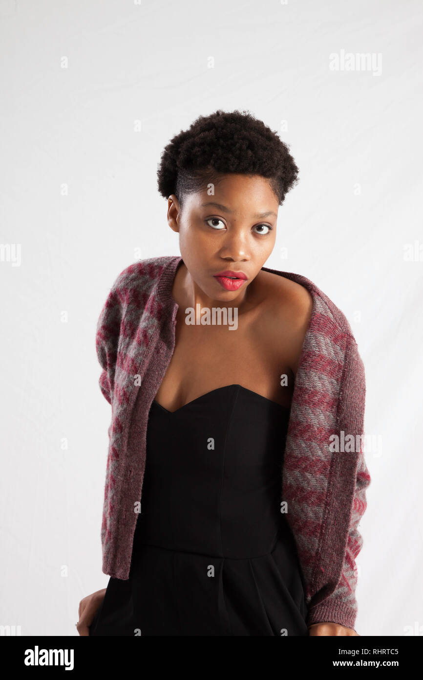 Beautiful Black woman with bare shoulders and a jacket Stock Photo - Alamy