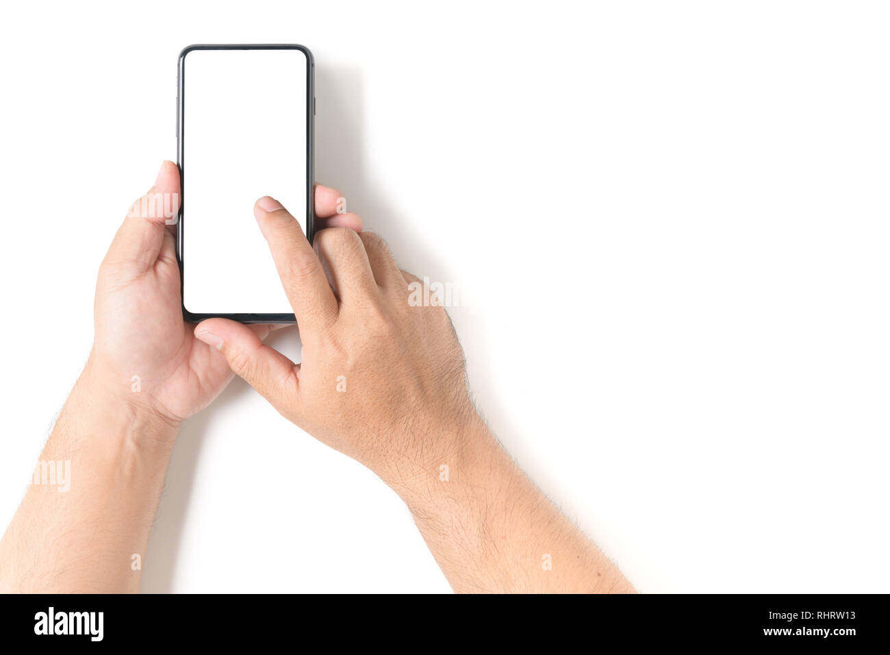 Man hand holding the black smartphone with blank screen isolated on ...
