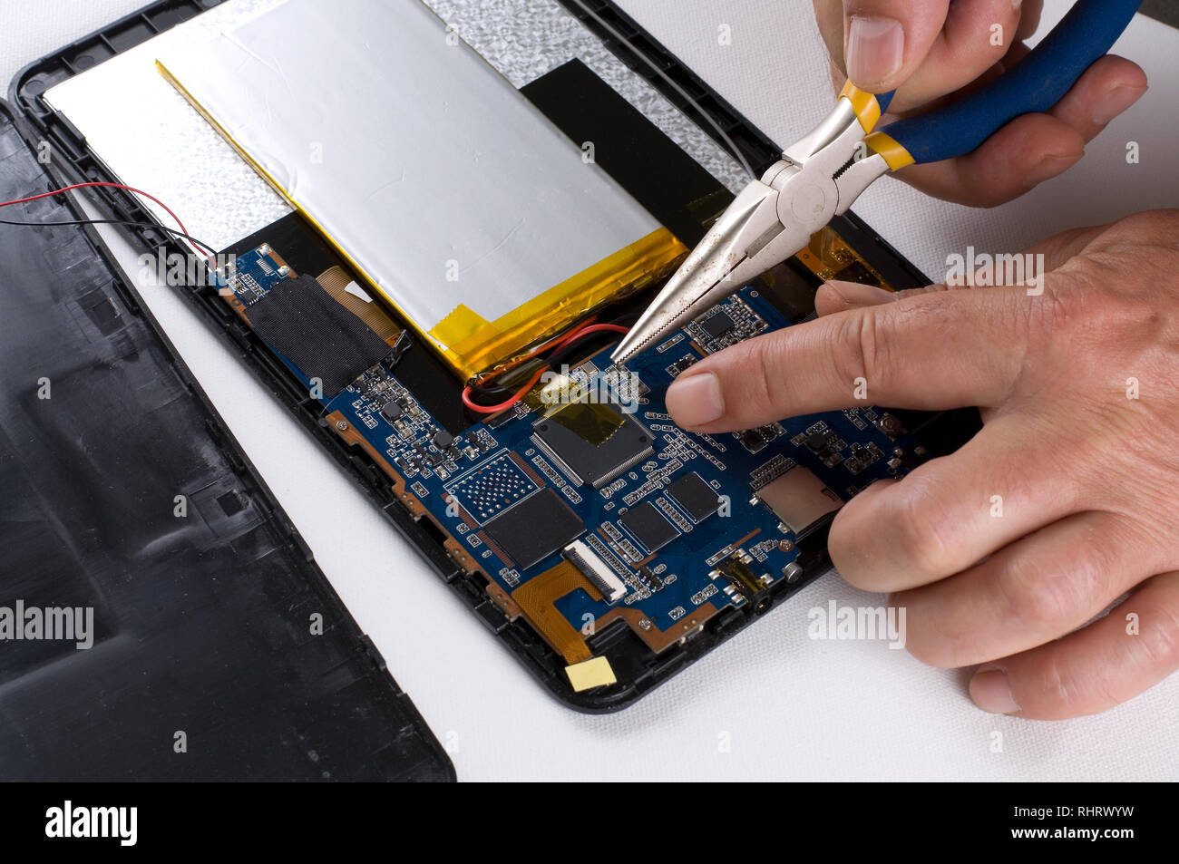 Repairman Soldering Electronic Device on White Background Stock Photo Alamy