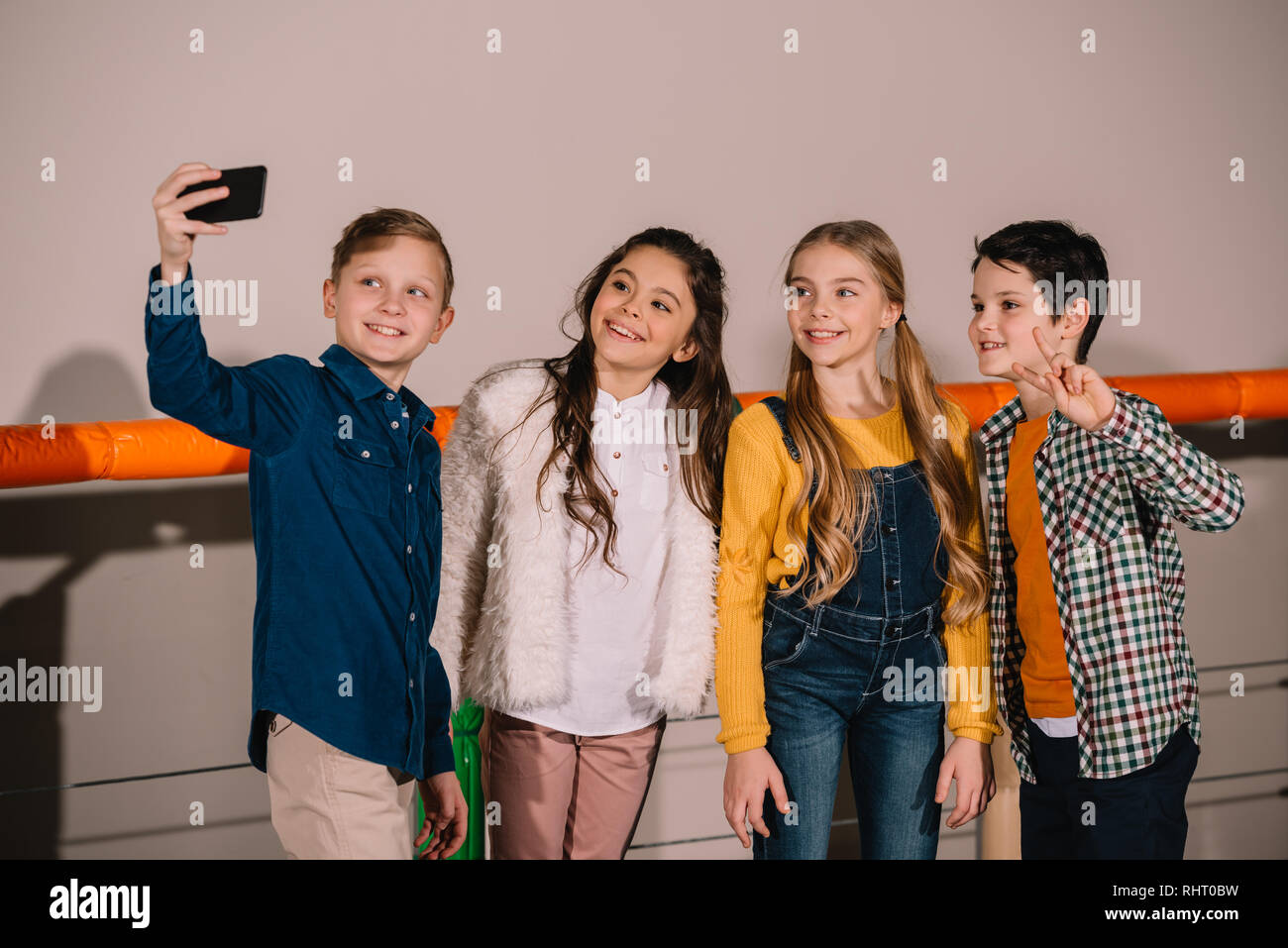 Group of preteen friends making selfie with smile Stock Photo
