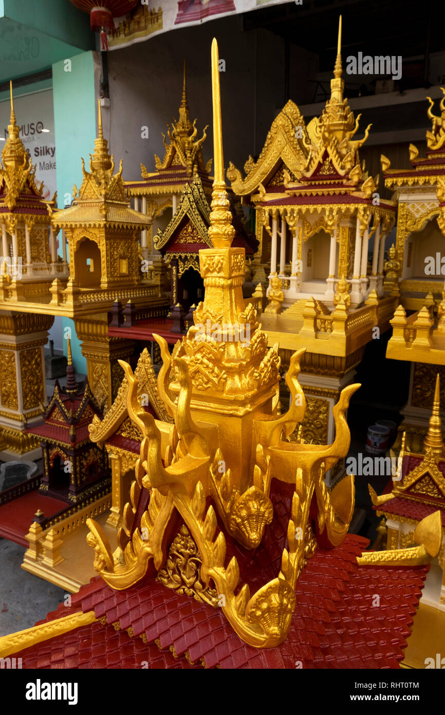 Cambodia, Phnom Penh, Preah Norodom Boulevard, Buddhist spirit houses on display outside shop